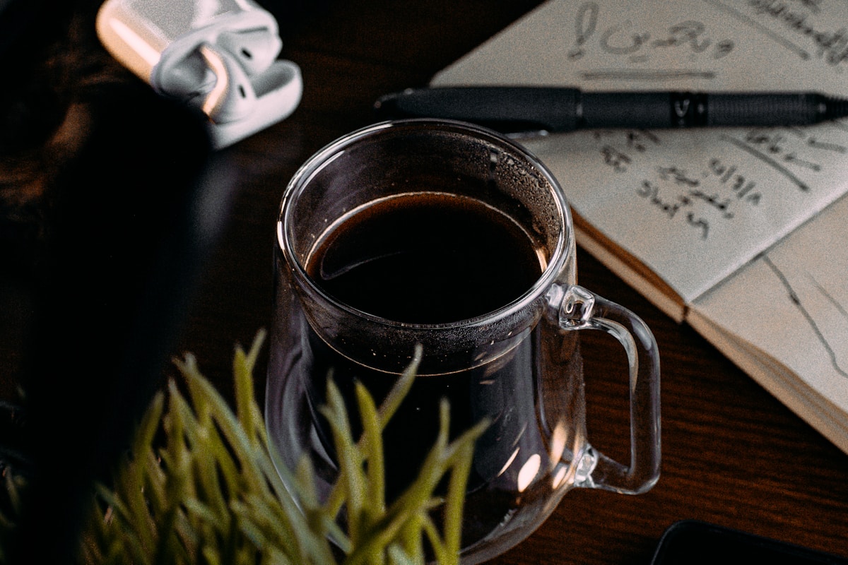 Sample photograph of coffee and an open notebook